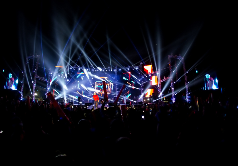 Concert crowd under stage lights